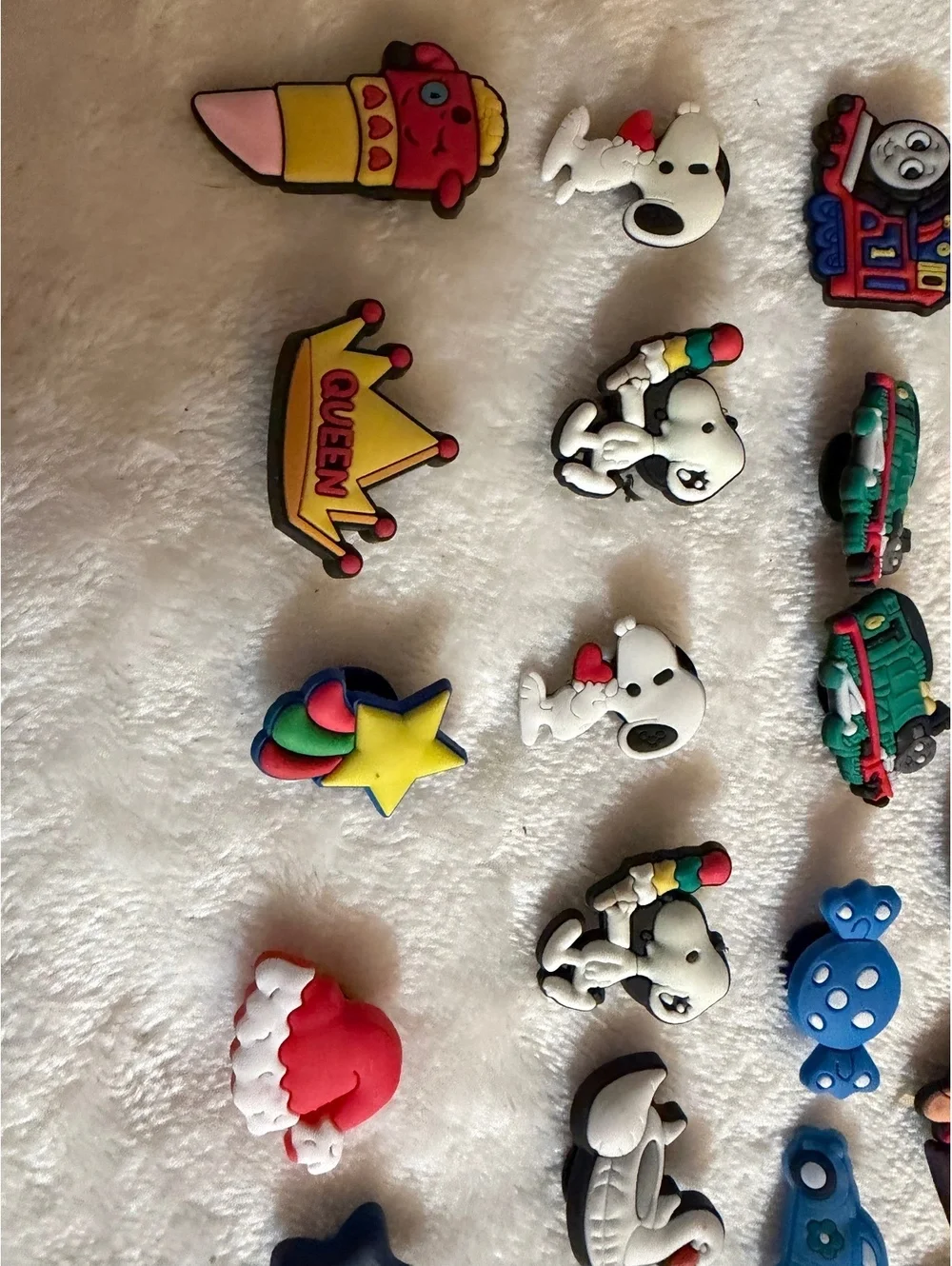 Jubbitz collection of colorful cartoon-themed shoe charms
